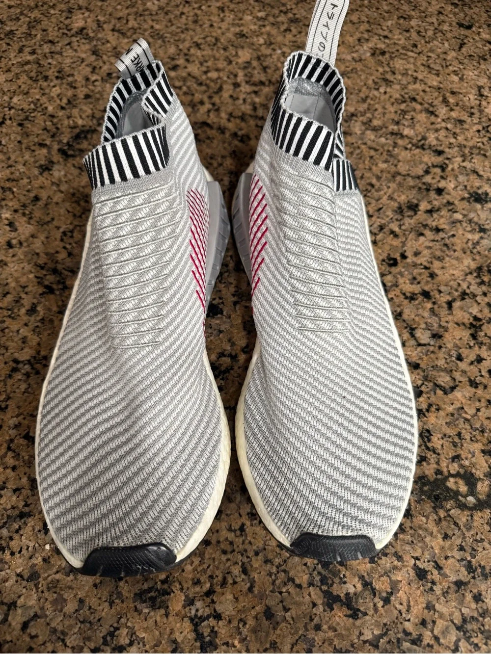 adidas White and Black Slip-On Knit Sneakers with Red Accents